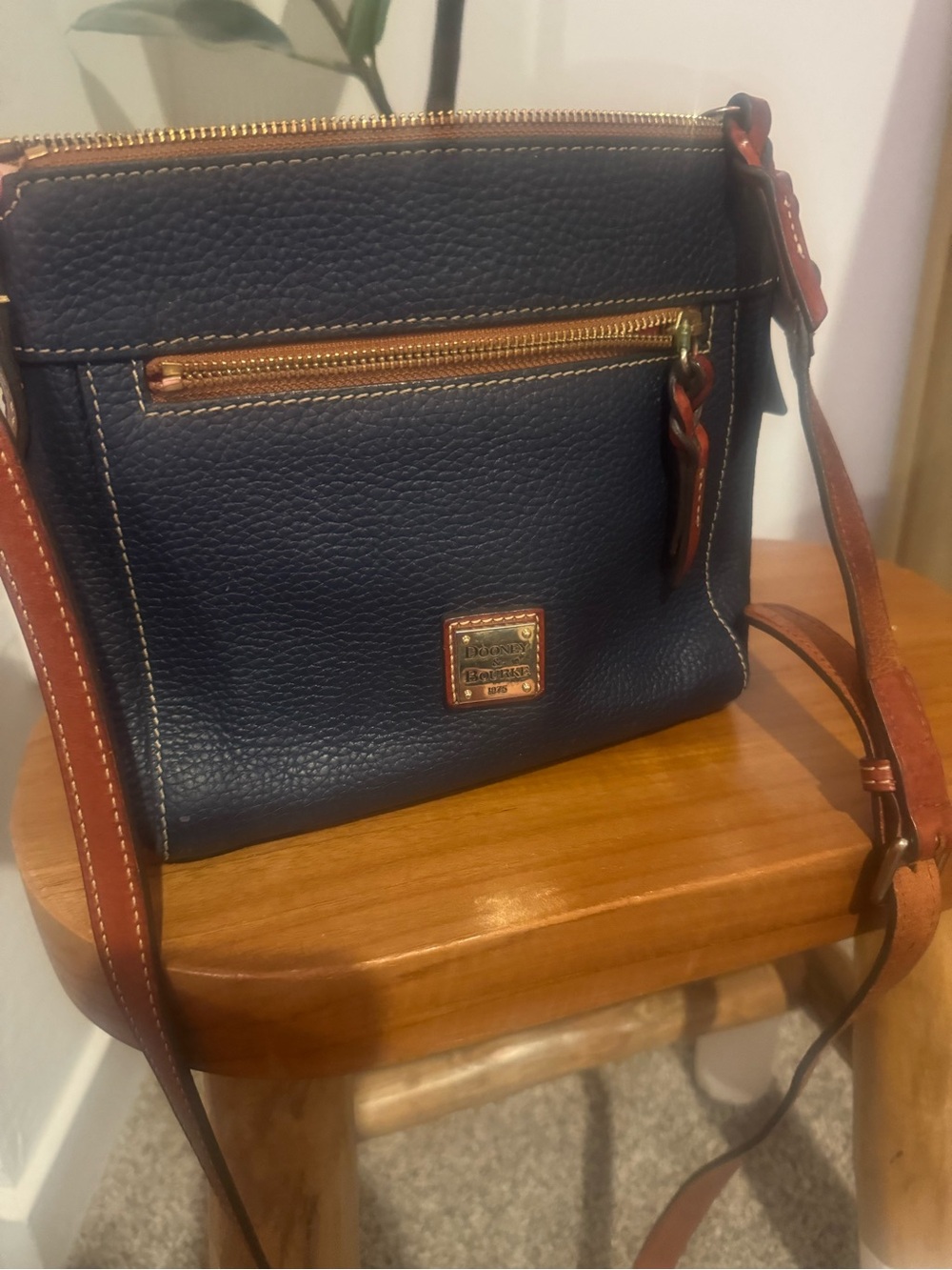 Dooney & Bourke Navy Pebble Leather Crossbody with Brown Trim and Gold Hardware